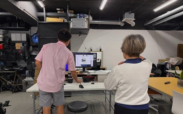 Reviewing photographs on a monitor in the studio